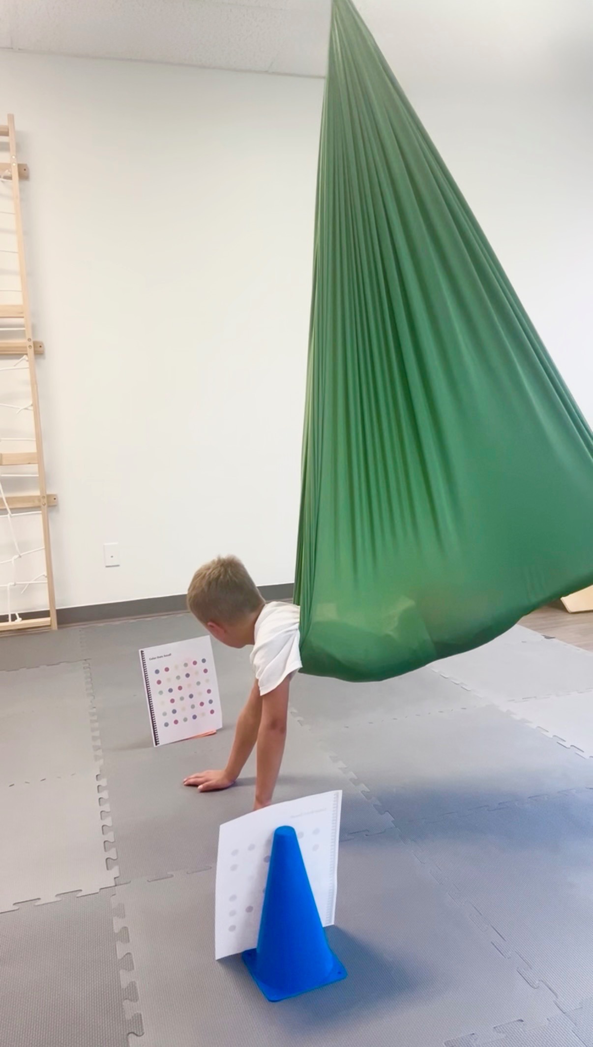 Therapeutic swing activities during an intensive therapy session